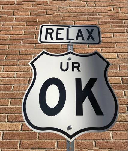 Street Sign that says "Relax You're OK"